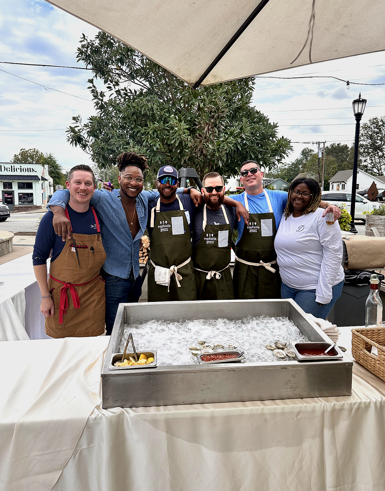 Catering team behind a fresh oyster raw bar