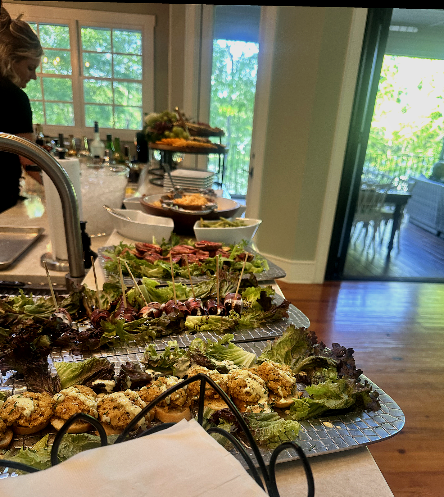 Appetizer buffet with silver platters of hors d'oeuvres